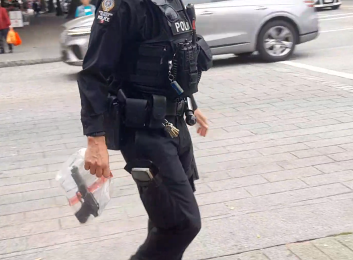 Police officer walking with equipment